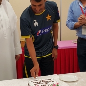 Younis Cutting the cake
