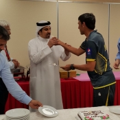 Younis Khan sharing cake with vice-president Sharjah Cricket Club Mr Waleed Bukhatir