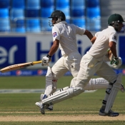 Younis Khan and Azhar Ali running between the wickets