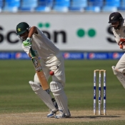 Younis Khan defends the ball