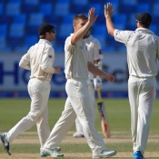 James Neesham celebrates the wicket of Younis Khan
