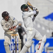 Mohammad Hafeez plays a pull shot