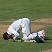 Mohammad Hafeez does a Sajjda infront of God after his century