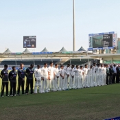 Players and officials of Pakistan and New Zealand teams observed a minute's silence and wore black armbands