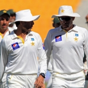 Younis Khan and Misbah-ul-Haq going off the field after winning the 1st Test against New Zealand