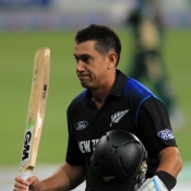 Ross Taylor raises his bat as he was going off the field