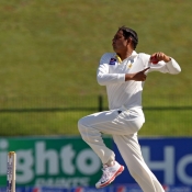 Zulfiqar Babar is about to deliver the ball