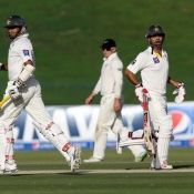 Azhar Ali and Ahmed Shehzad running between the wickets