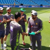 Abid Ali and Saad Ali receiving ODI cap