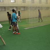 Training session of per-season camp participants at the Bob Woolmer indoor cricket school NCA Lahore