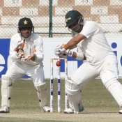 Kamran Akmal plays a cut shot