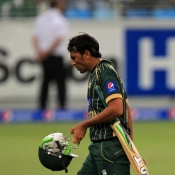 Younis Khan walking back towards pavillion after getting out