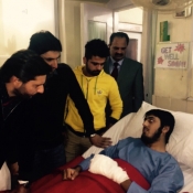 Shahid Afridi, Ahmed Shehzad and Misbah-ul-Haq meet injured Army Public School Peshawar student at CMH
