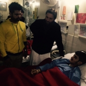 Shahid Afridi and Ahmed Shehzad meet injured Army Public School Peshawar student at CMH
