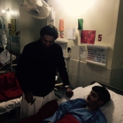 Shahid Afridi meets injured Army Public School Peshawar student at CMH