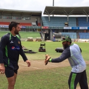 Mushtaq Ahmed giving some tips to Shahid Afridi during practice session