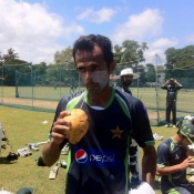 Zia-ul-Haq having drink during practice session
