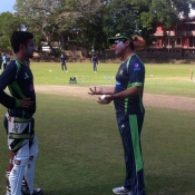 Pakistan A team player getting tips from his coach