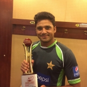 Azhar Ali poses with Man of the series trophy