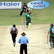 Naved Malik hits a six