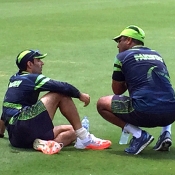 Waqar Younis and Misbah chat during a brief breather