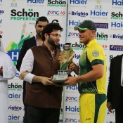 Australia captain Aaron Finch receives the winning T20 trophy
