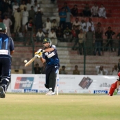 Karachi Dolphins skipper Shahid Afridi hits a six against Quetta Bears