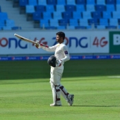 Ahmed Shehzad celebrates his century on day 4 of 1st Test between Pakistan and Australia at Dubai