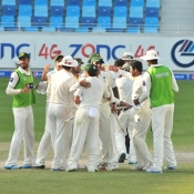 Pakistan team celebrate win over Australia on the final day of the 1st Test at Dubai