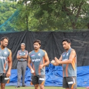 Imran Ali, Wahab Riaz and Aizaz Cheema discussing during the net session, Hyderabad, India