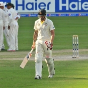 Mitchell Johnson walking back towards the pavillion after stumped by Sarfraz Ahmed on the final day of the 1st Test at Dubai