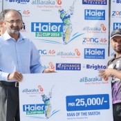 Faisalabad Wolves Farrukh Shehzad receives Man of the match award in Bank Albaraka Presents Haier T20 Cup match against AJK Jaguars