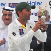 Younis Khan poses with Man of the Match trophy on the final day of the 1st Test at Dubai