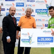 Lahore Lions Kamran Akmal receives Man of the match award in Bank Albaraka Presents Haier T20 Cup match against Abbottabad  Falcons