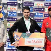 Naved Yasin of KRL receives Man of the match award against UBL