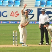 Steve O'Keefe about to delivers the ball on day one of 1st Test between Pakistan and Australia at Dubai