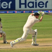 Steven Smith plays a cover drive on the final day of the 1st Test at Dubai