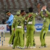 Multan Tigers players celebrate their win in Bank Albaraka Presents Haier T20 Cup match against FATA Cheetas