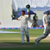 Younis Khan acknowledges crowd applauds after scoring historic century against Australia on day 4 of 1st Test between Pakistan and Australia at Dubai