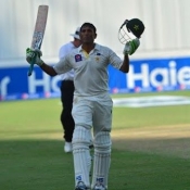 Younis Khan celebrates his historic century against Australia on day 4 of 1st Test between Pakistan and Australia at Dubai