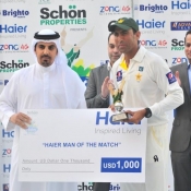 Younis Khan receives Man of the match award after winning the 1st Test match against Australia at Dubai