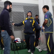 Mushtaq Ahmed with Mohammad Hafeez during the training camp for ICC World Cup 2014/15